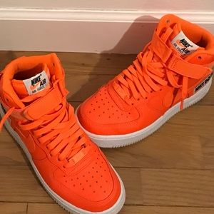 Orange Nike high top Air Force 1 sneakers